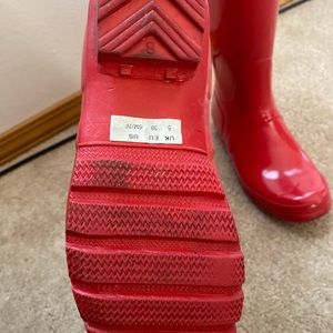 Glossy red hunter boots